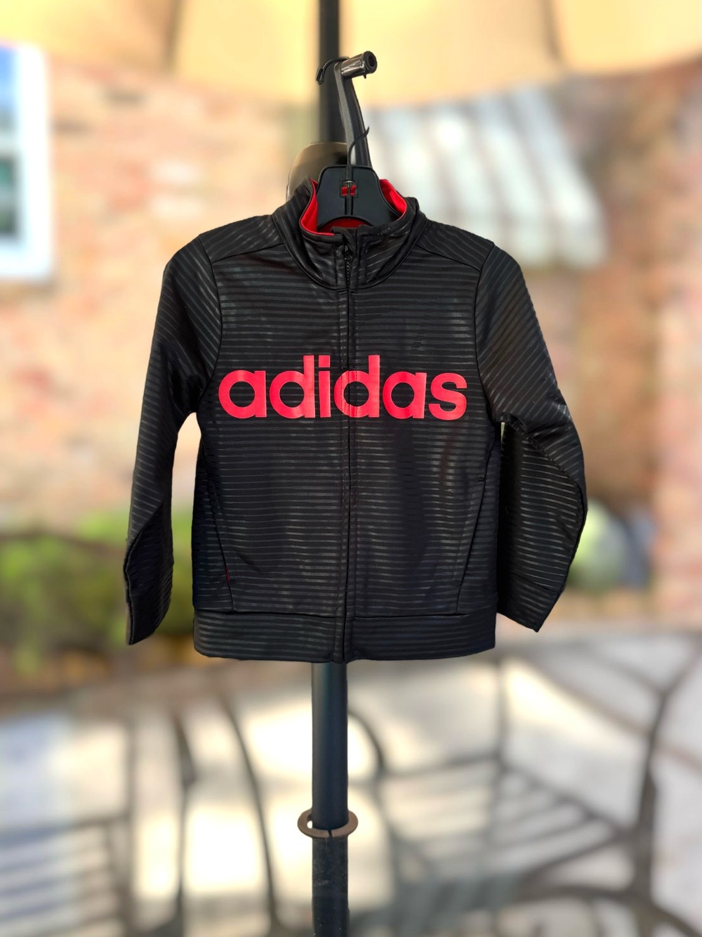adidas Black Kids Zip-Up Jacket with Red Logo